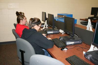 Publications students working in class